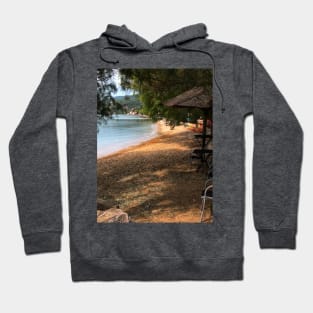 Scenic view on Mediterranean sea from beach cafe under fir trees and tiki bar Hoodie